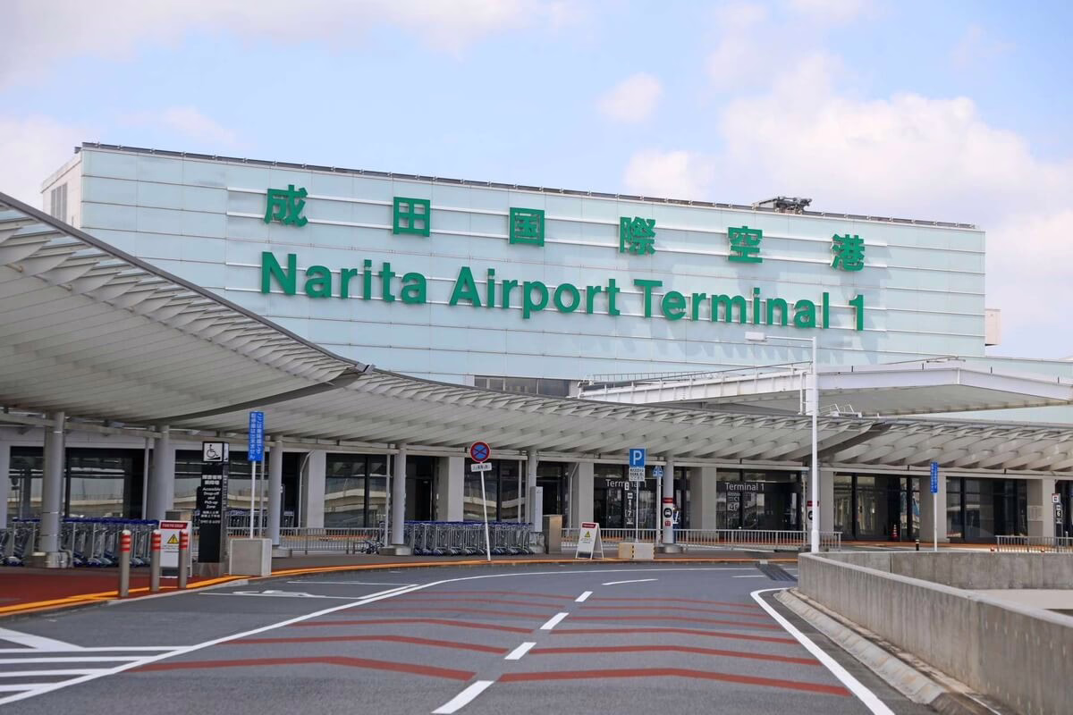 Narita Airport Terminal 1’s entrance showcases a modern design, welcoming travelers to Japan's major international hub.