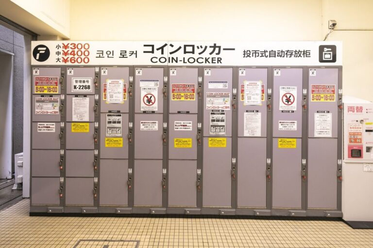 Coin lockers in a public space provide secure storage options for visitors, with various sizes and pricing displayed prominently.