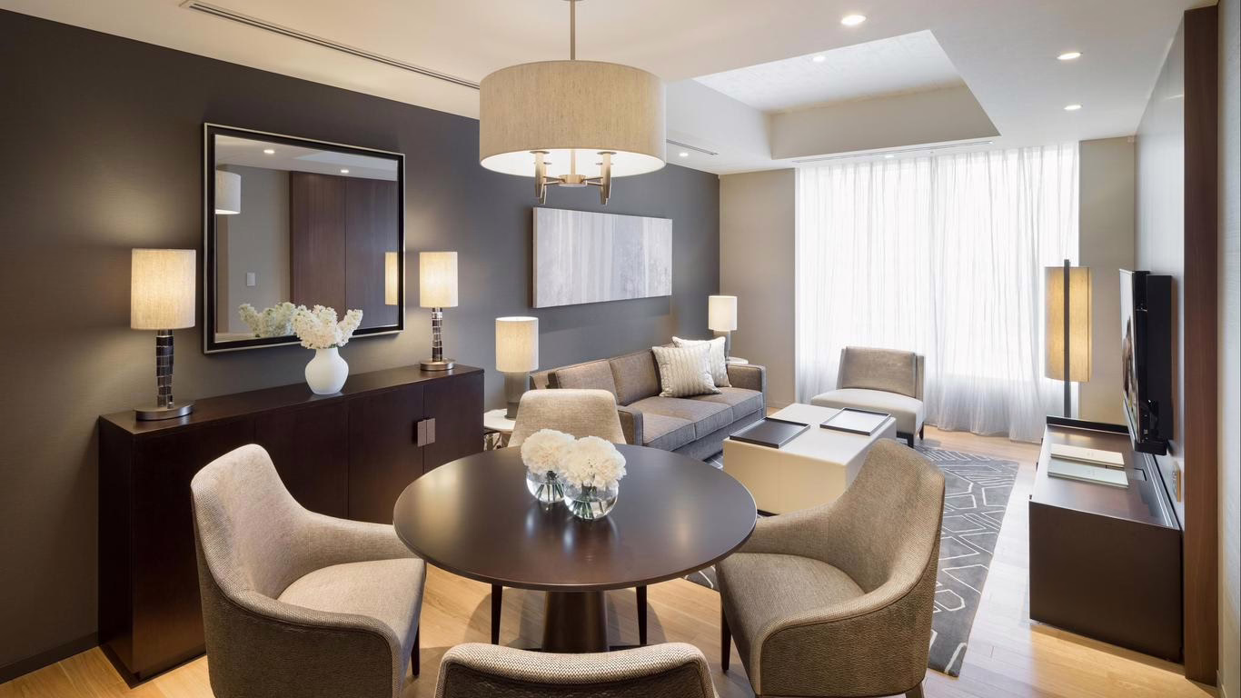 Contemporary living room with stylish decor, soft lighting, and a cozy seating area perfect for relaxation or socializing.