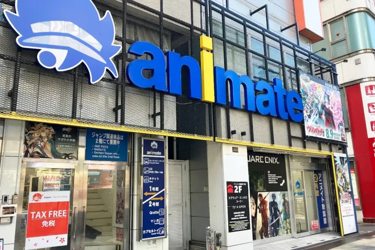 Brightly branded Animate store front in Japan, featuring popular anime merchandise and promotional displays for events.